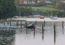 Two rescued as car’s engulfed by incoming tide