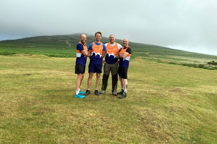 Lee Wicketts (2nd left) 9 Peaks MND climb training dartmoor