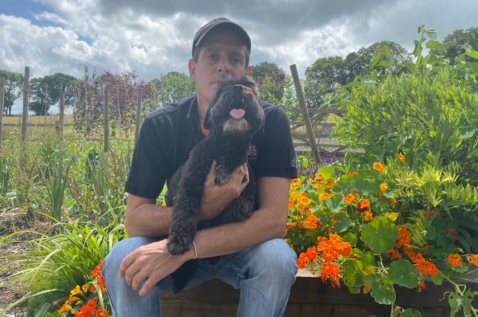 Milo therapy dog with Matt Carew at Battling On Merryhue Farm, Callington 