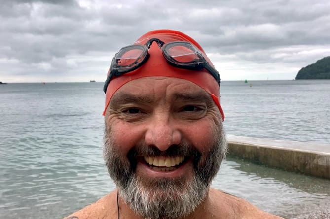 Former Marine a ‘hero’ after swim