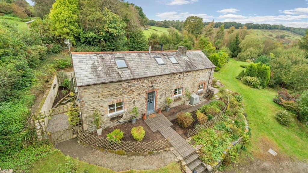 Tamar Valley cottage for sale in woodland area was once a farm dairy
