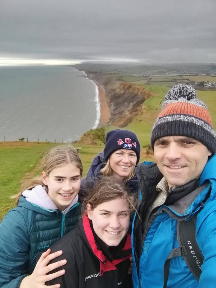 Nevah Richards, far left, with her family.
