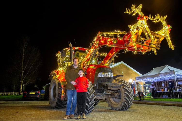 Tractor xmas stags lights boy and man