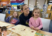 Children turn cave painters in library art sessions