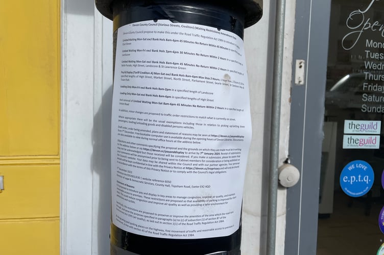 One of the DCC waiting restrictions amendment notices in Crediton High Street.  AQ 7179
