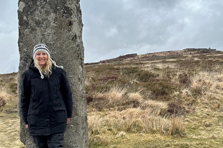 Museum of Dartmoor Life and Kristy Turner at a Dartmoor Menhir.