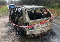 Crapstone road's new obstacle - a burned out car