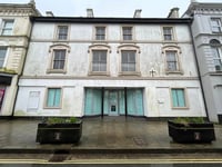 Councillor moots idea of buying former bank