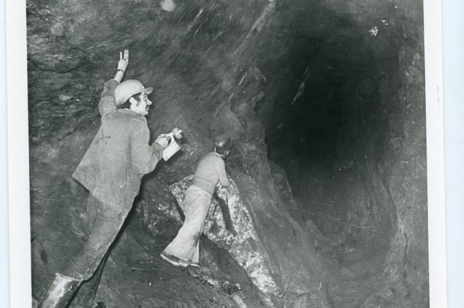 A dramatic photo deep underground from a Tavistock historic image collection