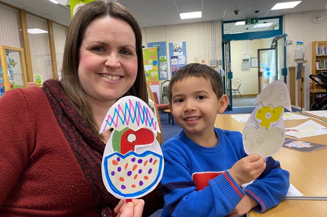 Sarah and Oscar Pomarin making Easter eggs with a difference at Tavistock LibraryJ