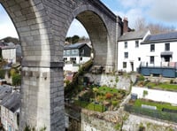 "Enchanting" cottage for sale beside viaduct has panoramic river views