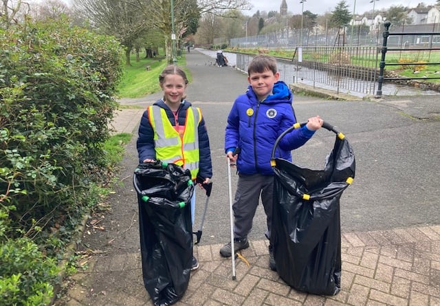 Holly and Oliver keeping Tavistock spick and span volunteering with Tidy Tavi litter picking group