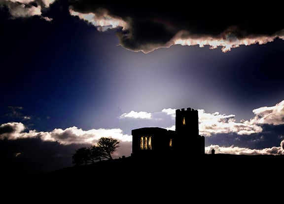 A suitably atmospheric image of St Michael de Rupe Church at Brentor
