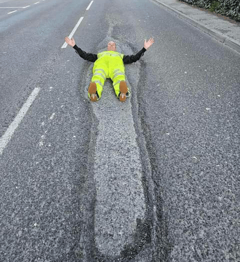 Tavistock's Mr Pothole lies down in crater