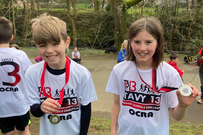 Whitchurch runners Olivia and George boy and girl age group winners in the Tavy 13 primary Challenge..