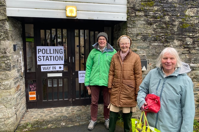 Voters queue at Tavistock Parish Centre polling station to choose their next councillor in Tavistock North ward for West Devon Borough Council.