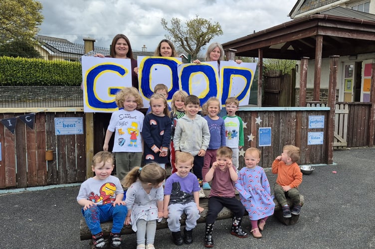 Bere Alston School children celebrating their Good Ofsted grading.