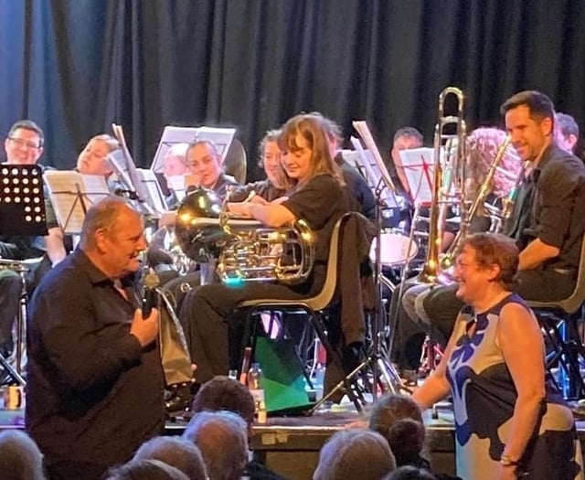 Tributes to brass band founder as he hangs up his baton after 20 years