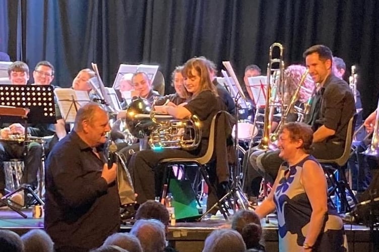 Peter and Sarah Jones are thanked at the Devon County Youth Brass Band 20th anniversary concert