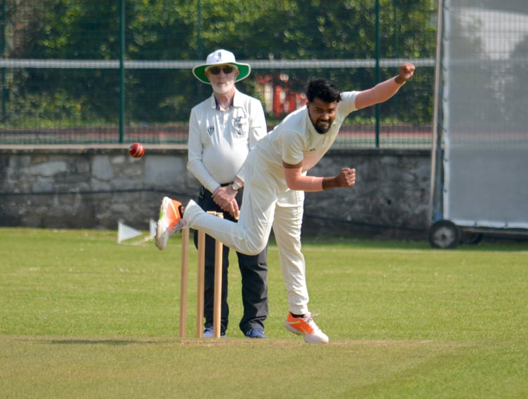 Yelverton's opening bowler Deepanshu Gahlawat flings down a delivery in the match against South Devon, which his team lost by eight wickets