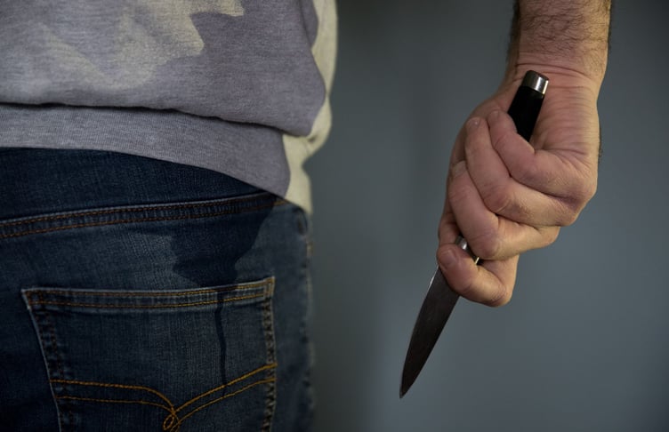 A model poses holding a knife. PA Photo. Picture date: Thursday January 16, 2020. Photo credit should read: Andrew Matthews/PA Wire