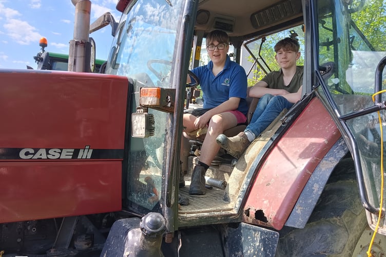 Getting behind the wheel at the Harrowbeer Airfield family fun day.