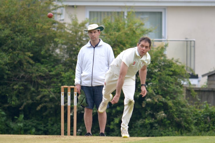 Hatherleigh 2nd XI seamer Matt Dennis bowling up the hill at Babbacombe during his side's 101-run defeat