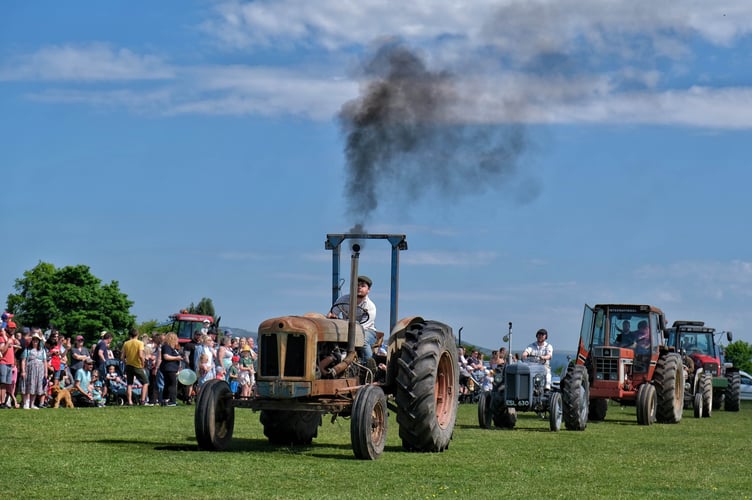 Will Searle on his Fordson Super Major tractor, driving in his brother Luke Searle's memory