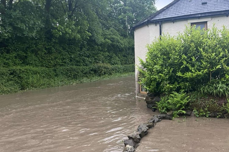 The Toll House is marooned on Parkwood Road. 