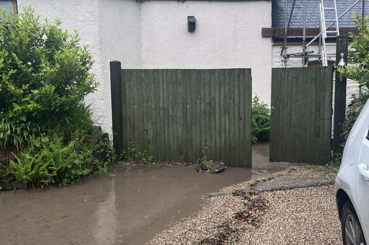 The flood recedes from inside Toll House.