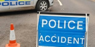 Car on its side after crash in Lamerton
