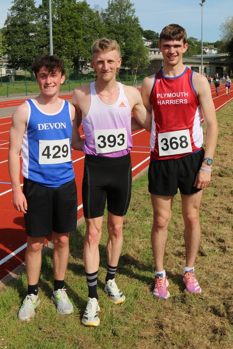 Tavi 5K race winners Reuben Sebag-Montefiore (third), Josh Benford (first) and Jack Dee (second).