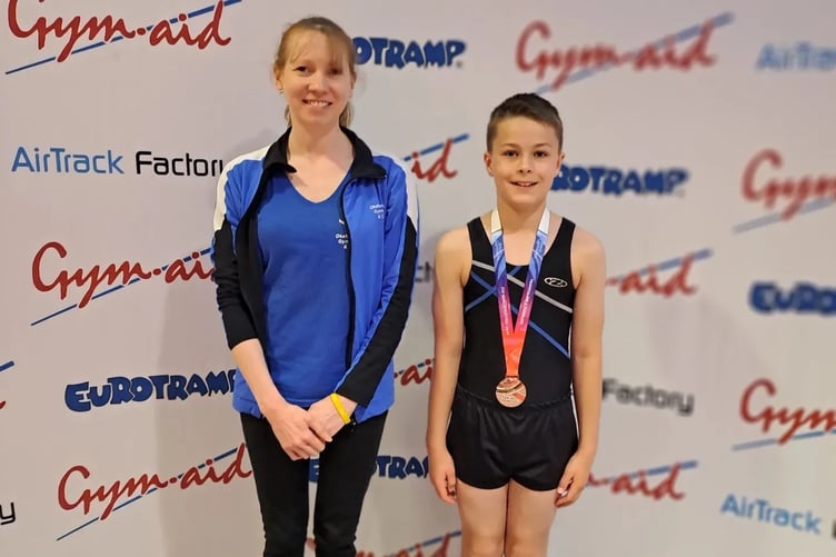 Mason Parker-Groves with coach Vicki Pritchard