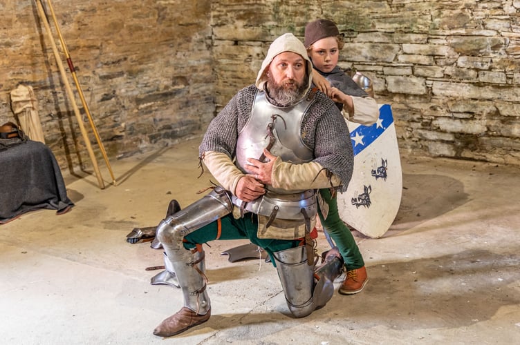 Buckland Abbey Fathers' Day event featured dads and sons dressing in Medieval costume.