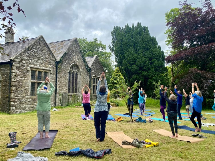 Yoga in Calstock churchyard – part of the event.