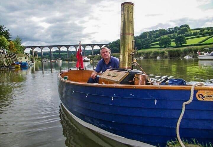 Exploring the river in a classic boat.
