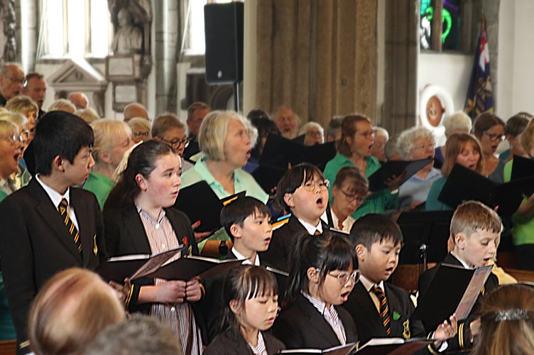 The Plymouth Philharmonic Choir and Fletewood School choir singing together