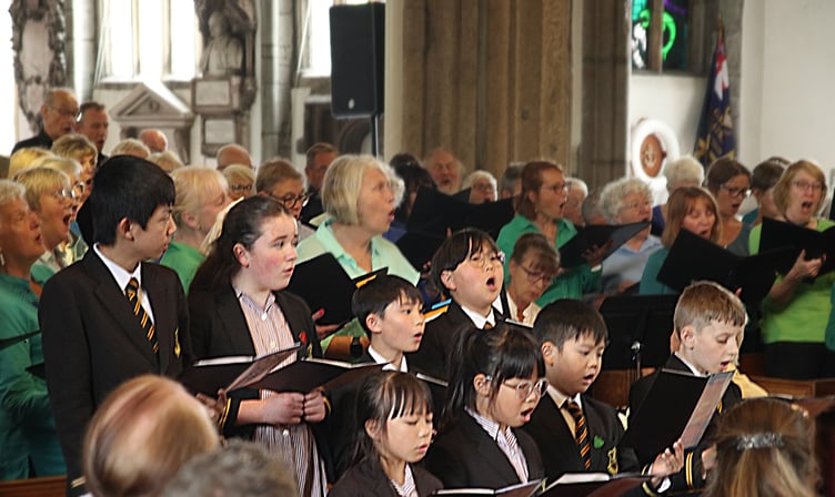 The Plymouth Philharmonic Choir and Fletewood School choir singing together