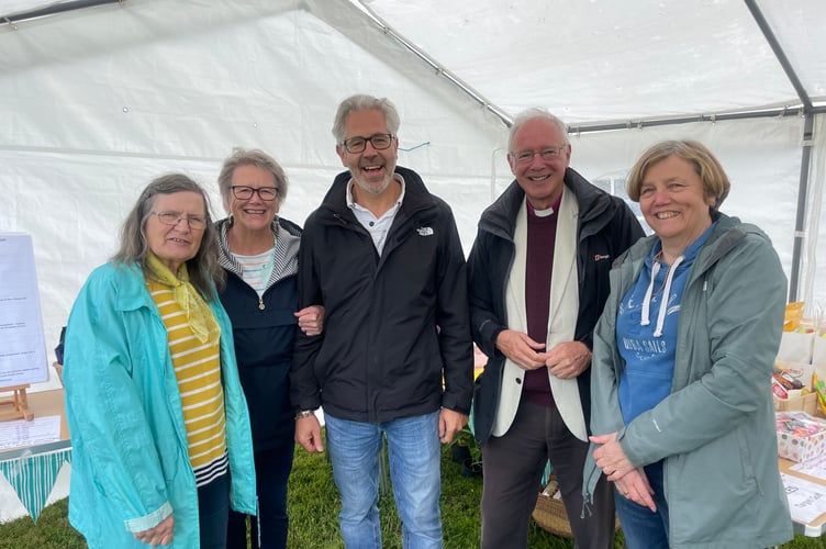 Spreyton Fair organisers and helpers, from left, Judith Talbot, Les Jewell, Antony Baglioni and right, Gill Archer, with, fourth left, Rt Rev Nicholas McKinnel, who opened the Fair. AQ 5168