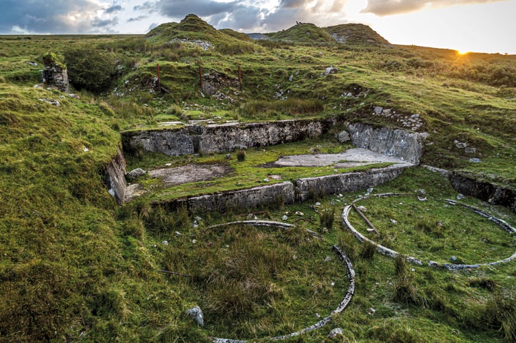 Misty dawn over Hooten Wheals mine, Dartmoor National Park, Devon.