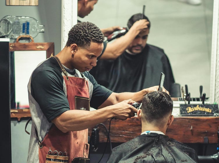 man getting hair cut