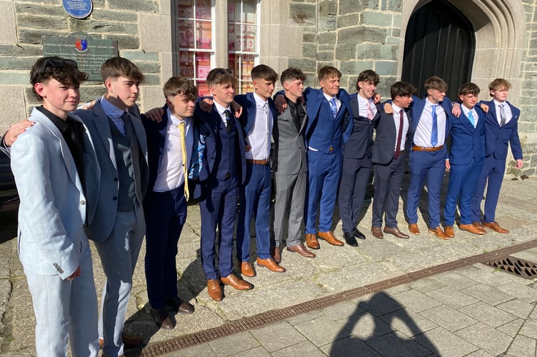 A happy line-up of students smartly dressed up for their proms in Tavistock's Bedford Square