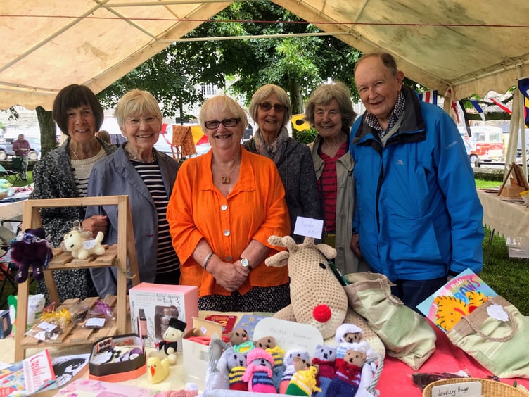 Manning the handicrafts stall, from left, Sue Burnham Marian Rutter, Ruth Glanville, Audrey Masters and Janet and Alston Kennerley.