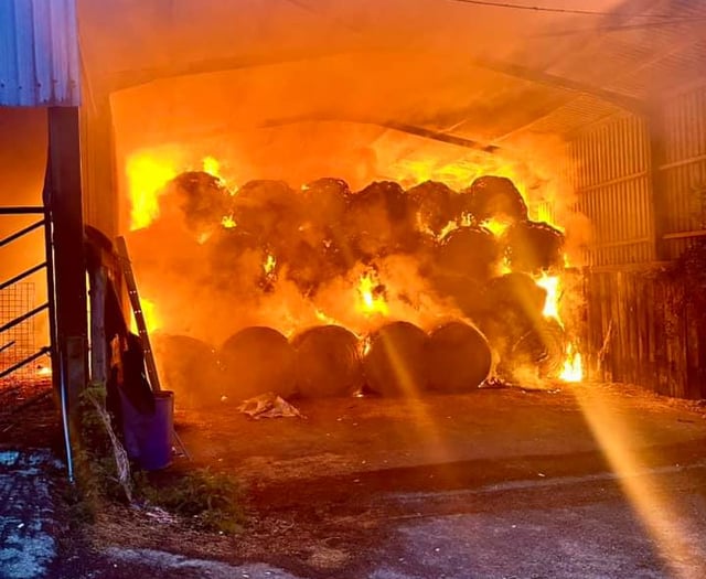 Farm fire sparks hay barn warning