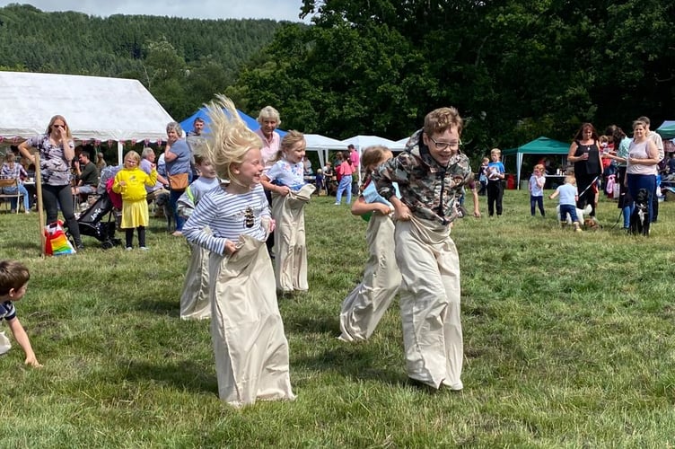 Jumping for fun - Gulworthy Fete sack race at a previous event.