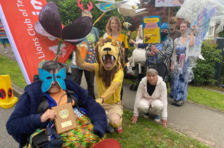 Environmental group Transition Tavistock dressed as animals under threat with costumes designed by a young student.