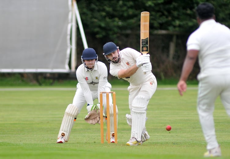 Devon Cricket League A Division. Abbotskerswell versus Tavistock. Tavi batsman Charlie Barriball and Abbots' 'keeper Ed Smout Cooper