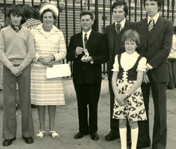 Les Cribbett, who died earlier this year, with his family at Buckingham palace after receiving his Royal Victorian Medal for service the Duchy of Cornwall. 
