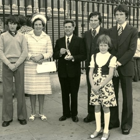 Les Cribbett, who died earlier this year, with his family at Buckingham palace after receiving his Royal Victorian Medal for service the Duchy of Cornwall. 
