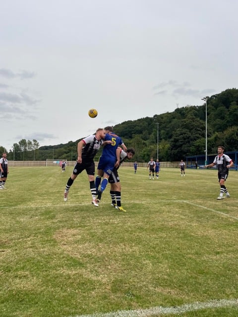 Oke Argyle and Middlezoy competing for an aerial ball